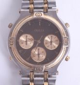 Gucci, a gents chronogrpah wristwatch with receipt dated 1989, boxed and papers.