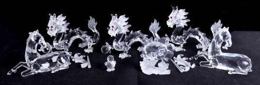 Swarovski, two unicorns (broken horns) with three dragons (5).