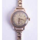 Syma, a 9ct ladies wristwatch with 9ct bracelet, overall 18.8g.