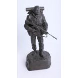 A bronze effect sculpture of a Royal Marine, Falklands, 1982, height 24cm.