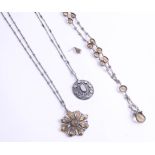 A stylish crystal pendant, together with a vintage necklace set with various citrine-type stones and