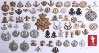 A collection of approx. 70 military cap badges, including Seaforth Highlanders, Highland Light