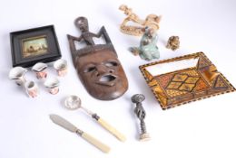 An assortment of items including miniature Tony Wood character jugs, ornate pewter handled seal,
