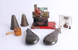 Mixed collection including powder horns, brass lids, incomplete Mamod steam engine and a crested