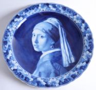 A Delft blue and white charger by Thooft and Labouchere of 'The girl with the pearl earring' after