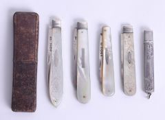 Four silver and mother of pearl fruit knives and pencil.