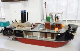 A large model paddle steamer with servo, scratch built with remote control and travel box, length