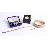 A 9ct bangle together with 9ct cuff links, 9ct watch chain (38.5g), 22ct wedding band 3.8 g, and