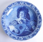 A Delft blue and white charger by Thooft and Labouchere, depicting 'The Serenade' after J.