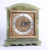 Dent, London, an Elliott clock in green marble case, height 16cm.