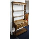 Cottage oak two part dresser with open rack, two drawers and pot board, width 92cm.