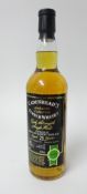 A bottle of Cadenhead's Scotch Whisky, aged 21 years, distilled 1989, bottled 2010.