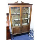 Edwardian inlaid mahogany two door display cabinet.