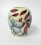 A small Moorcroft vase 'Jacobs Ladder', 10cm height.