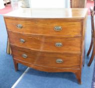 A 19th century mahogany bow fronted chest fitted with three long drawers on bracket feet, width