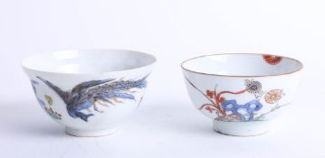 A Chinese porcelain tea bowl decorated with exotic bird and landscape with six character marks (fine