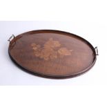 Edwardian mahogany oval inlaid serving tray with brass handles, length 60cm.