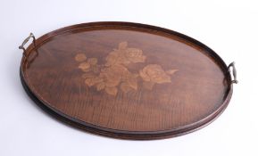 Edwardian mahogany oval inlaid serving tray with brass handles, length 60cm.