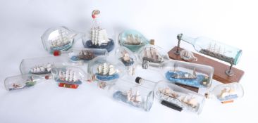 Collection of ships in bottles (15).