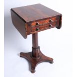 A 19th century rosewood work table on pedestal base.