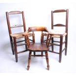 Pair of children's oak framed side chairs, and a smoker's bow armchair (3).