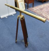 Replica brass telescope with folding stand.