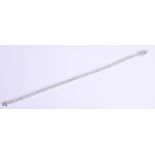 An 18ct diamond line bracelet, approximately 3.70ct, length 19cm.