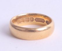 A 22ct gold wedding, approx. 8.70g.