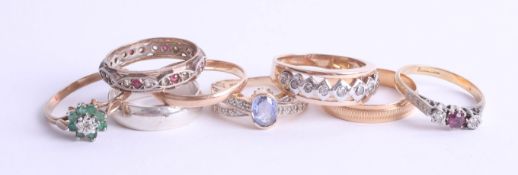 A collection of various dress rings include five 9ct gold rings (13.4g) and an 18ct ruby and