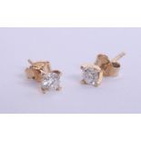 A pair 18ct yellow gold diamond stud earrings, approx 0.50ct, estimated colour and clarity D/SI1.