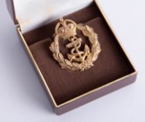 A 9ct gold Royal Navy sweetheart brooch with crowned fouled anchor, stamped Page, Plymouth, approx.
