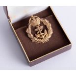 A 9ct gold Royal Navy sweetheart brooch with crowned fouled anchor, stamped Page, Plymouth, approx.