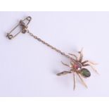 A Victorian tourmaline spider brooch.