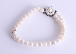 Two row cultured pearl bracelet, two row of 6mm pearls with silver fittings and 13.5mm matching