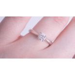 A modern 18ct diamond solitaire ring, approx. 0.50 carat, size L.