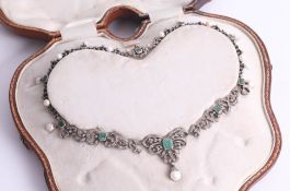 A beautiful Antique emerald, diamond and pearl necklace set with ten octagon cut emeralds sizes.