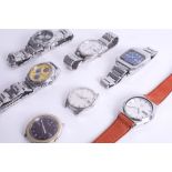 A collection of seven Seiko watches including three Seiko '5' automatics, one weekender day-date,