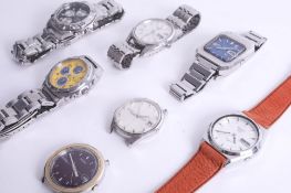 A collection of seven Seiko watches including three Seiko '5' automatics, one weekender day-date,