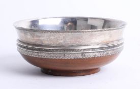 Early 20th Century silver circular dish on wood base, Sheffield, T B & S, diameter 12.5cm.