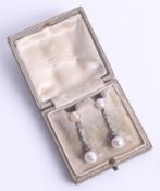 A pair of blister pearl and diamond drop earrings, boxed, length approx. 35mm.