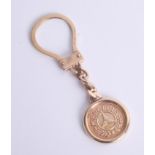 A 9ct gold Mercedes keyring, 15.10g.