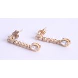 A good pair 18ct yellow gold and diamond set drop earrings, 4.4g.