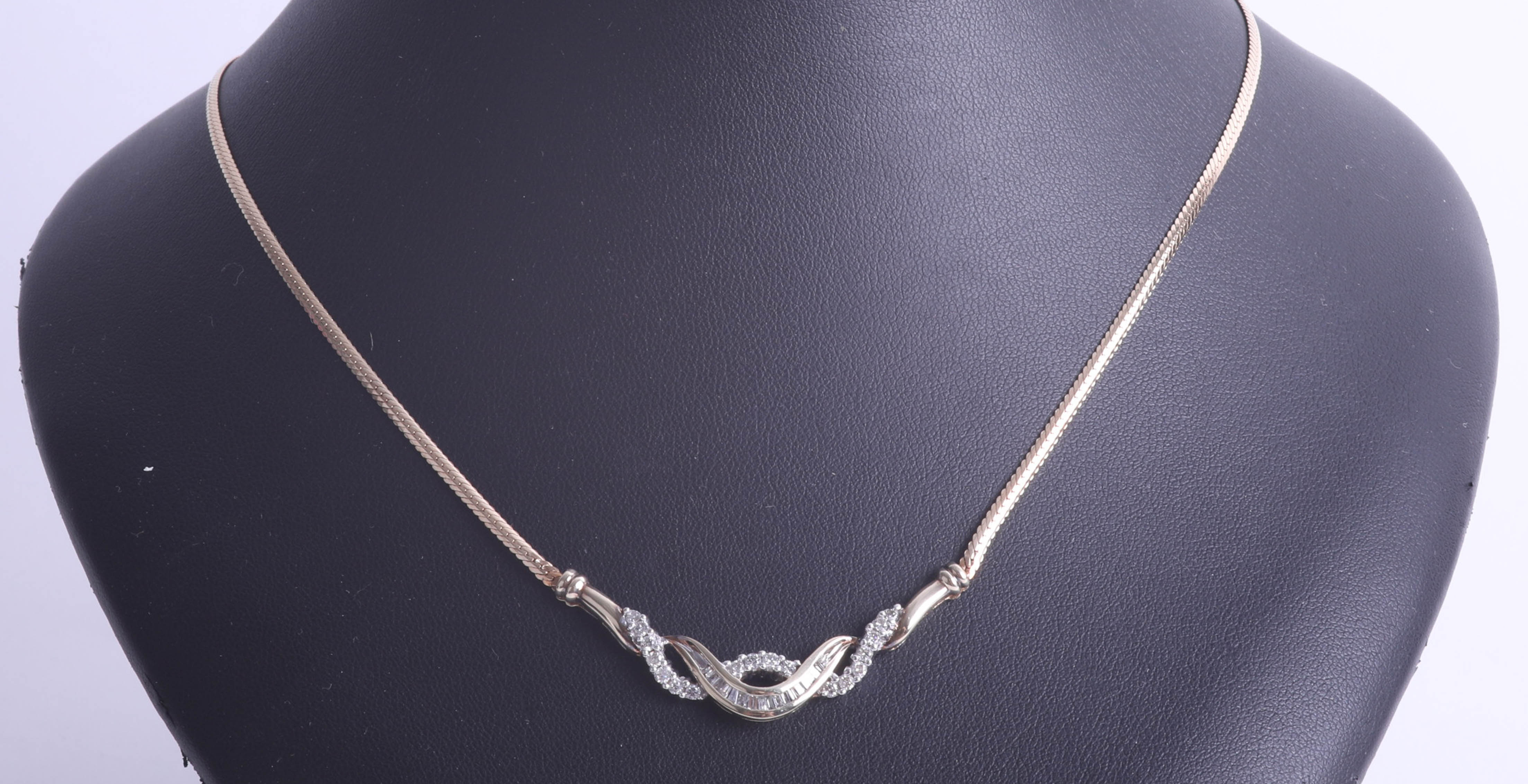 A 9ct diamond set fancy necklace, approx 7g. - Image 2 of 2
