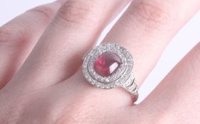 A fine Art Deco platinum ruby and diamond ring, the head approx. 15 x 14mm, size P.