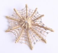 An impressive 18ct yellow gold and diamond set spider web brooch approx. 65 x 60mm, approx 33.30g.