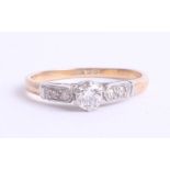 An 18ct diamond single stone ring, size L.