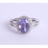 An 18ct white gold tanzanite and diamond ring, approx 2.75ct, Size N.