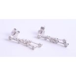 A pair 18ct diamond set drop earrings, 3.6g.