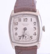 Rolex, a vintage silver cushion cased wristwatch, dial marked Brufords, Exeter, approx. 29 x 28mm.