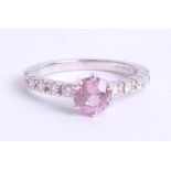An 18ct pink sapphire and diamond ring, size M, 3.9g.